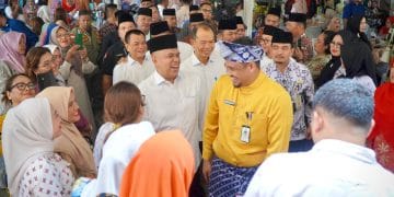 Bobby Nasution Kenakan Busana Adat Melayu di Halal Bihalal Pemkab Langkat, PJ Bupati Langkat Sambut dengan Senyum Bahagia