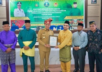 Pj.Bupati Langkat Akan Wajibkan Memakai Teluk Belanga di Hari Jum’at Untuk ASN