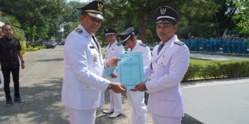 Pj Bupati Langkat Kukuhkan Perpanjangan Masa Jabatan 163 Kepala Desa: Semangat Kolaborasi Ditunjukkan dengan Jalan Kaki Bersama