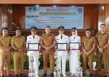 Penyematan Secara Simbolis Seragam Kepala Lingkungan se-Kota Binjai, dan Pemberian Piala Pemenang Lomba Kelurahan Tingkat Kota Binjai Tahun 2024