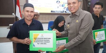 Pj Bupati Langkat Salurkan Bantuan Baznas Senilai Rp 221 Juta untuk Masyarakat yang Membutuhkan