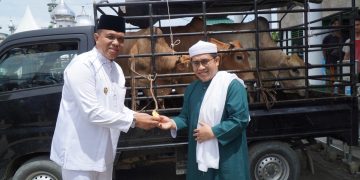 Jelang Haul ke-101 Tuan Guru Babussalam, Pj Bupati Langkat Faisal Hasrimy Serahkan Bantuan untuk Jamaah