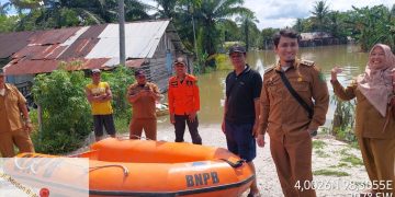 Pj Bupati Langkat Salurkan Bantuan untuk Warga Terdampak Banjir di Kecamatan Babalan dan Sei Lepan