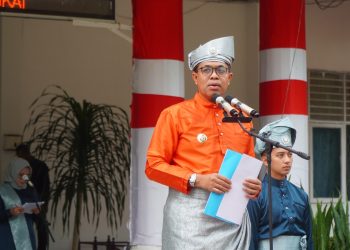 Pj Bupati Langkat Pimpin Upacara HUT ke-275 Kabupaten Langkat: Dorong Kinerja ASN dan Bagikan Santunan